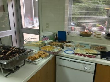 Thanksgiving dinner is set up buffet style in a kitchen