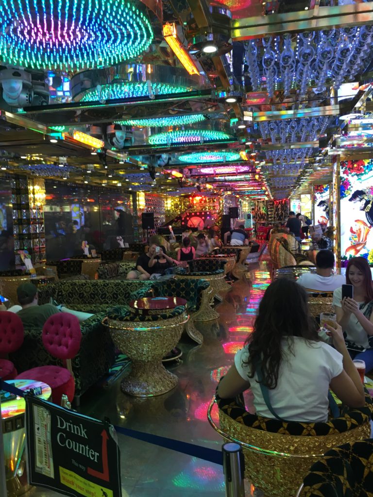 A very shiny waiting area with tables