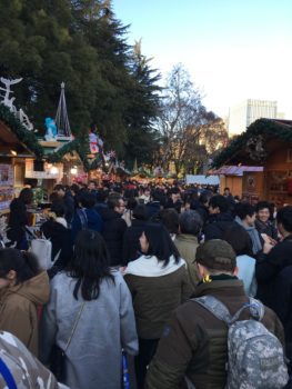 A crowd of people stretches as far as the eye can see