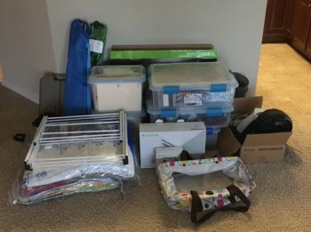 Items neatly stacked wait in a room to be packed and moved