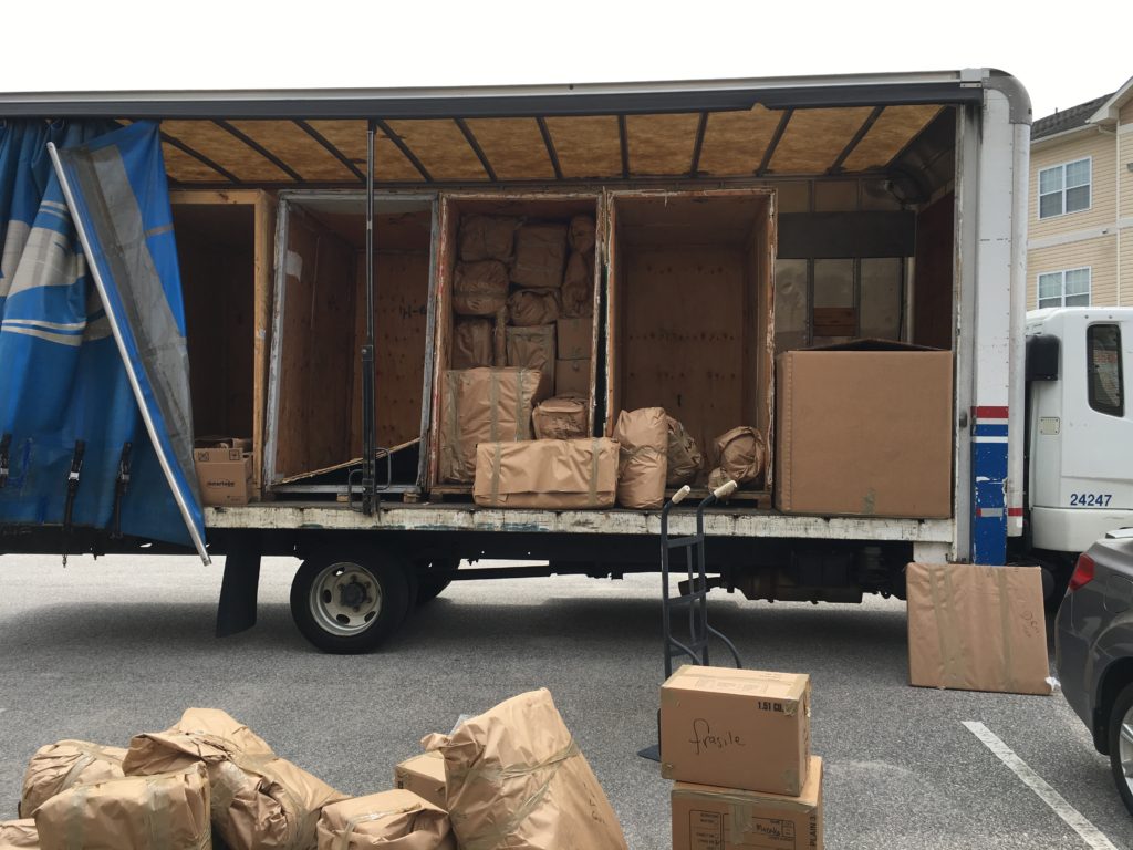 Items being loaded onto a truck for an overseas move